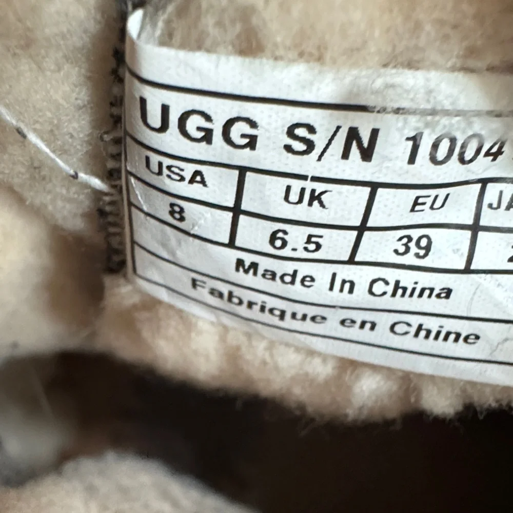 UGG Black and Tan Winter Boots